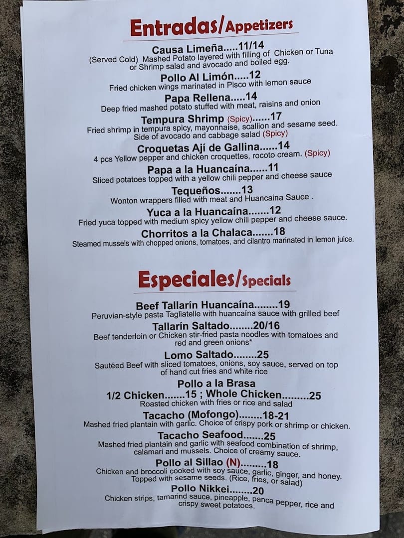 A white paper menu displays a list of Peruvian appetizers and specials with descriptions and prices.