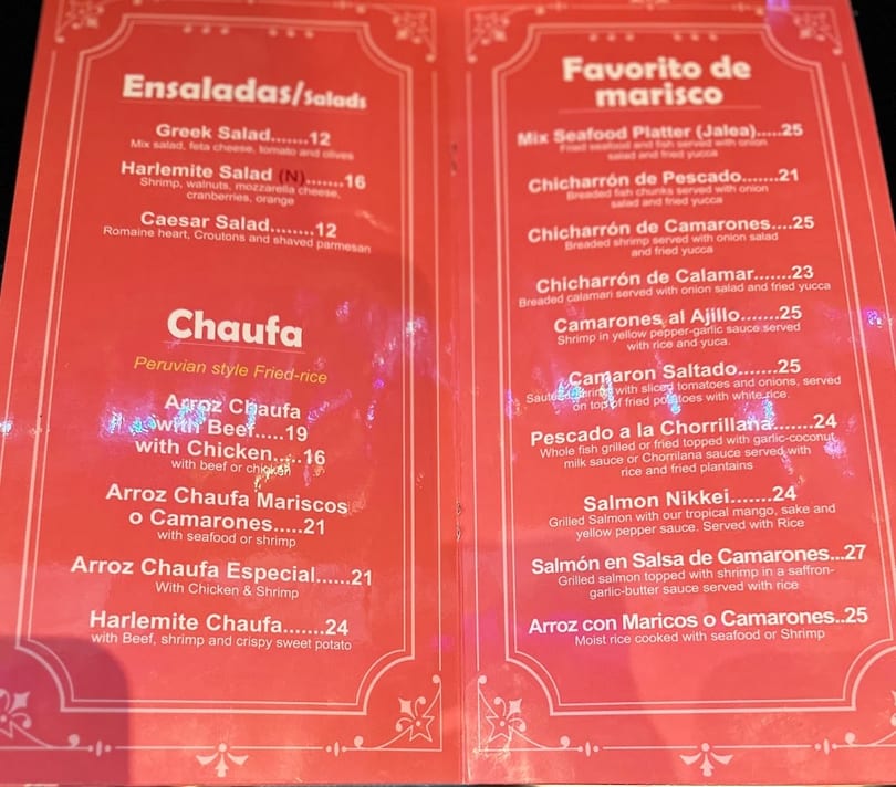 A red restaurant menu displays Peruvian salads, fried rice, and seafood dishes with prices.